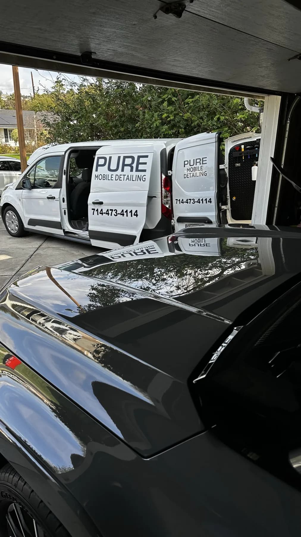 Finished vehicle reflecting the Pure Mobile Detailing van