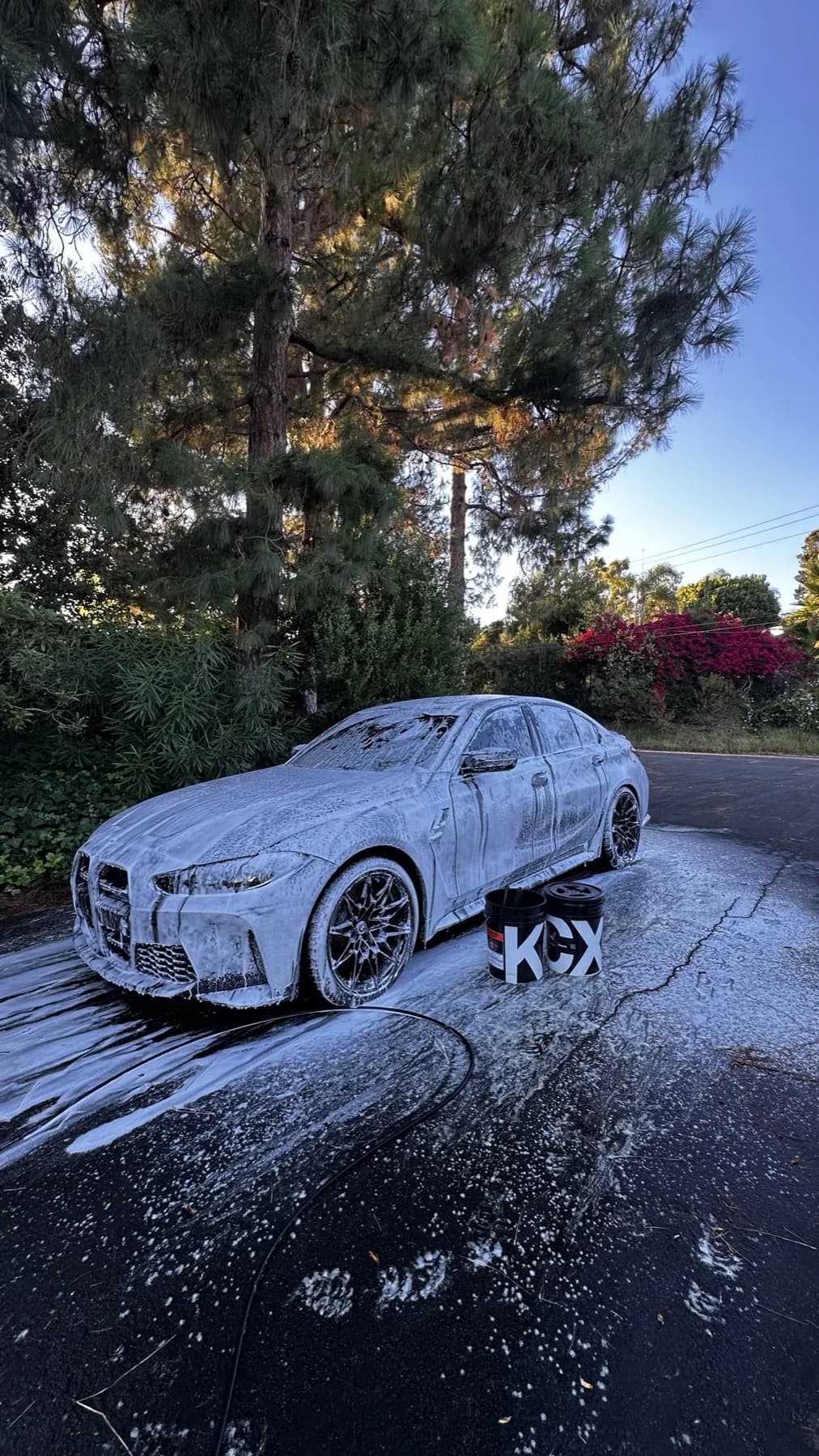 BMW covered in detailing foam